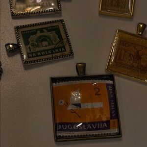 Set of 9 Vintage Eastern European Stamp Pendants